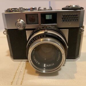 Vintage Aires 35 IIIS 35mm rangefinder camera, introduced in the late 1950s.